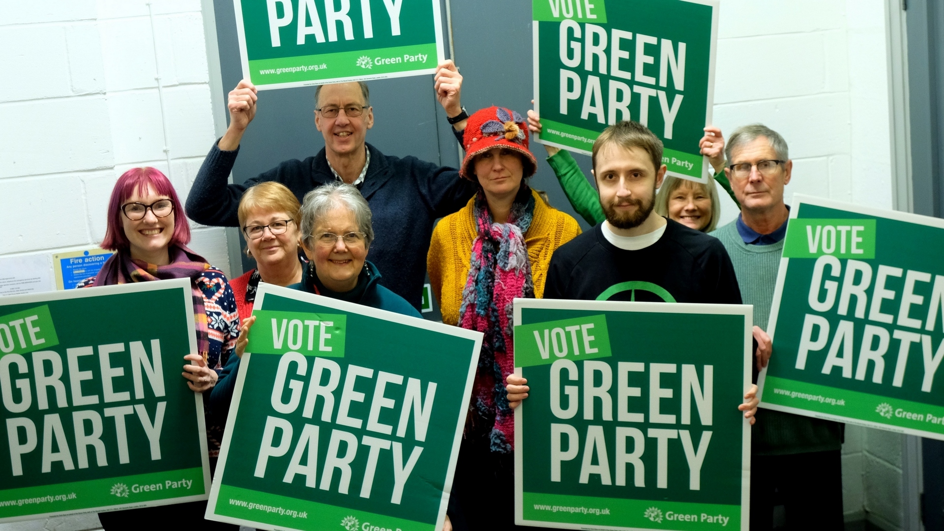 Group with placards banner